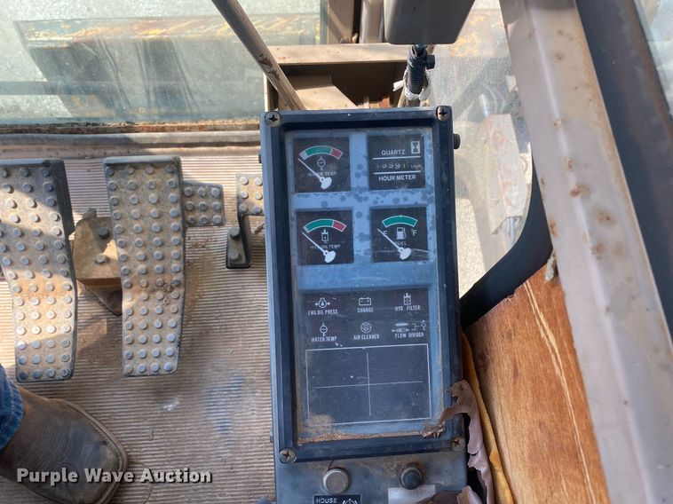 image for item DI7838 1987 John Deere 690CR  wheeled excavator