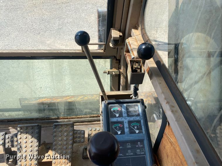 image for item DI7838 1987 John Deere 690CR  wheeled excavator