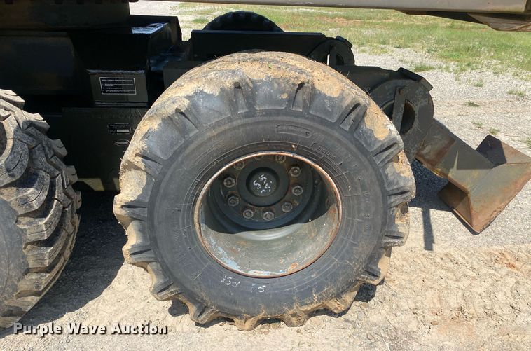 image for item DI7838 1987 John Deere 690CR  wheeled excavator