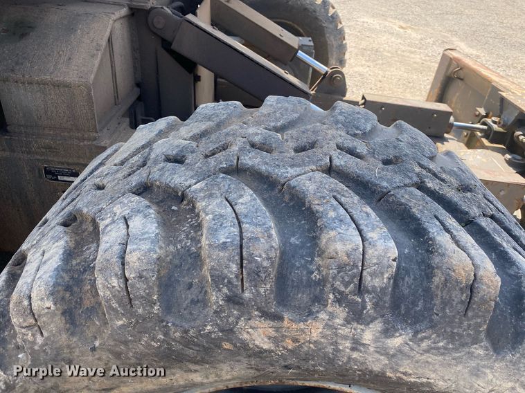 image for item DI7838 1987 John Deere 690CR  wheeled excavator