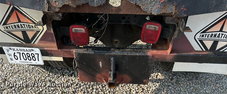 image for item DO5052 2000 International 4700  flatbed truck