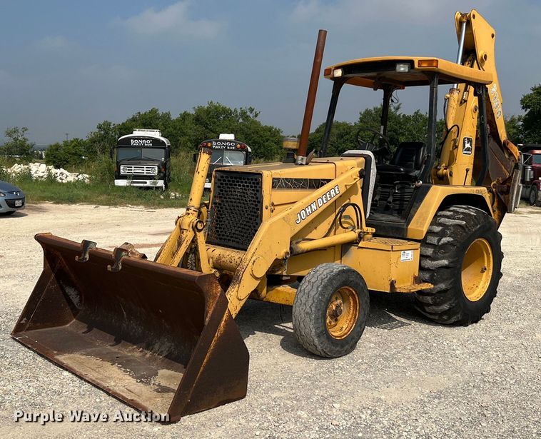 image for item DQ2109 1993 John Deere 310D  backhoe