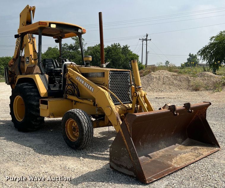 image for item DQ2109 1993 John Deere 310D  backhoe