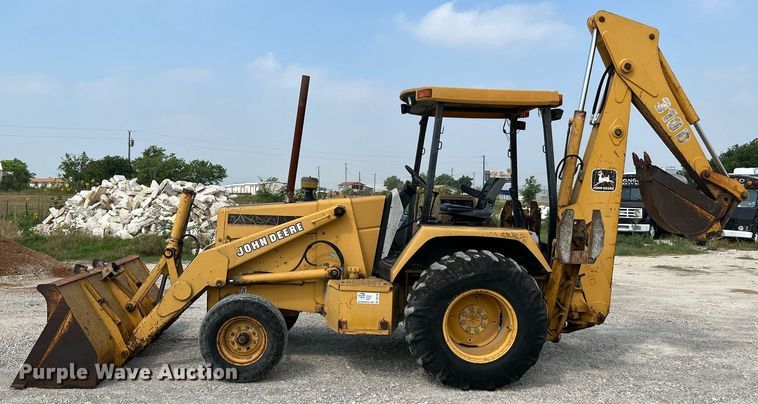 image for item DQ2109 1993 John Deere 310D  backhoe