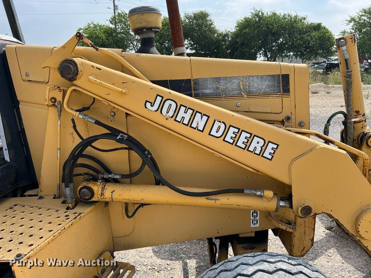 image for item DQ2109 1993 John Deere 310D  backhoe