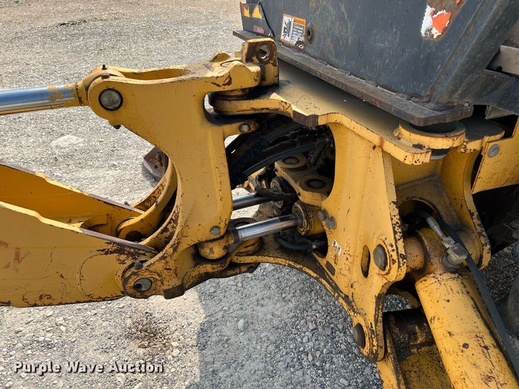 image for item DQ2109 1993 John Deere 310D  backhoe
