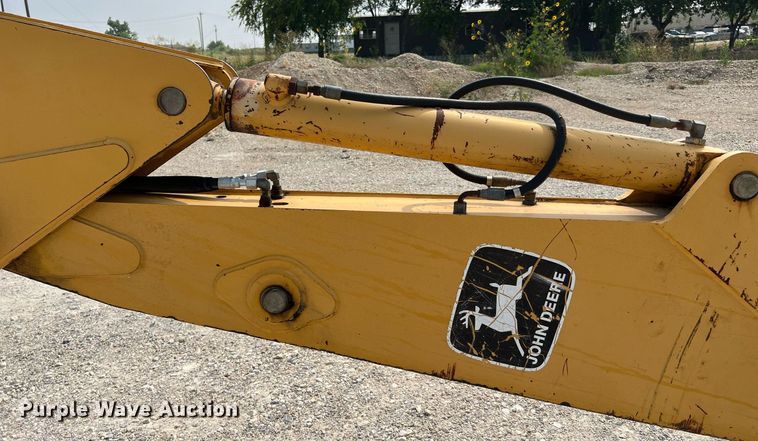 image for item DQ2109 1993 John Deere 310D  backhoe