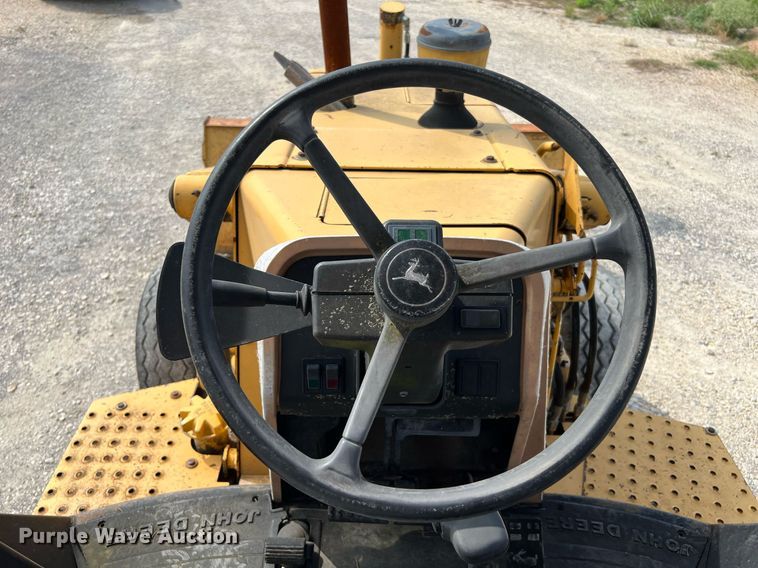 image for item DQ2109 1993 John Deere 310D  backhoe