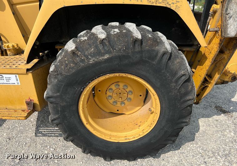 image for item DQ2109 1993 John Deere 310D  backhoe