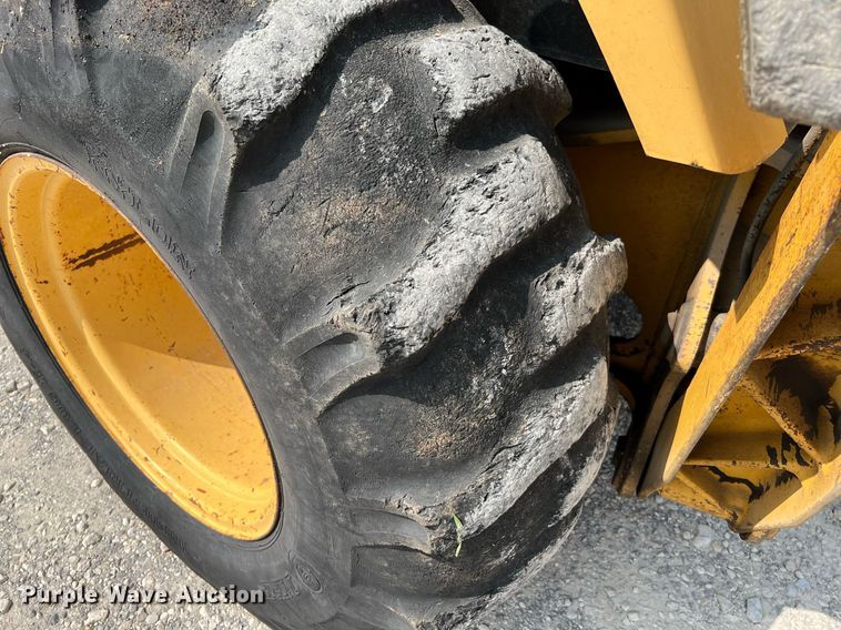 image for item DQ2109 1993 John Deere 310D  backhoe