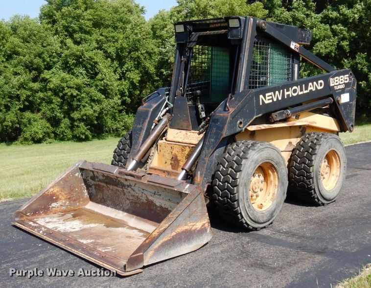 image for item DQ7331 1997 New Holland LX885 Turbo  skid steer loader