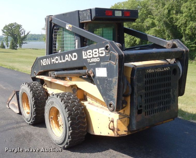 image for item DQ7331 1997 New Holland LX885 Turbo  skid steer loader