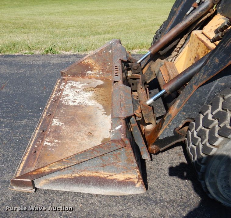 image for item DQ7331 1997 New Holland LX885 Turbo  skid steer loader