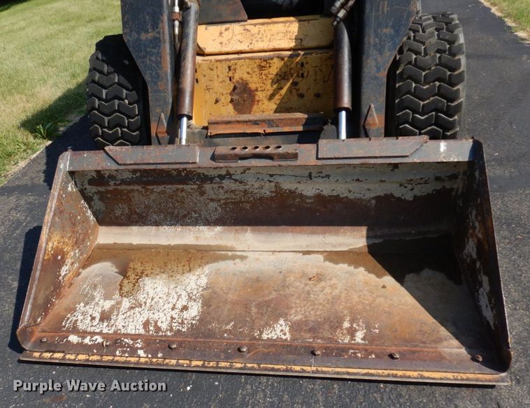 image for item DQ7331 1997 New Holland LX885 Turbo  skid steer loader