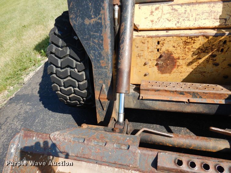 image for item DQ7331 1997 New Holland LX885 Turbo  skid steer loader