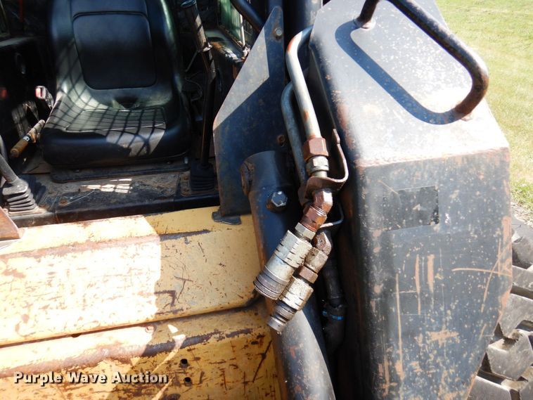 image for item DQ7331 1997 New Holland LX885 Turbo  skid steer loader