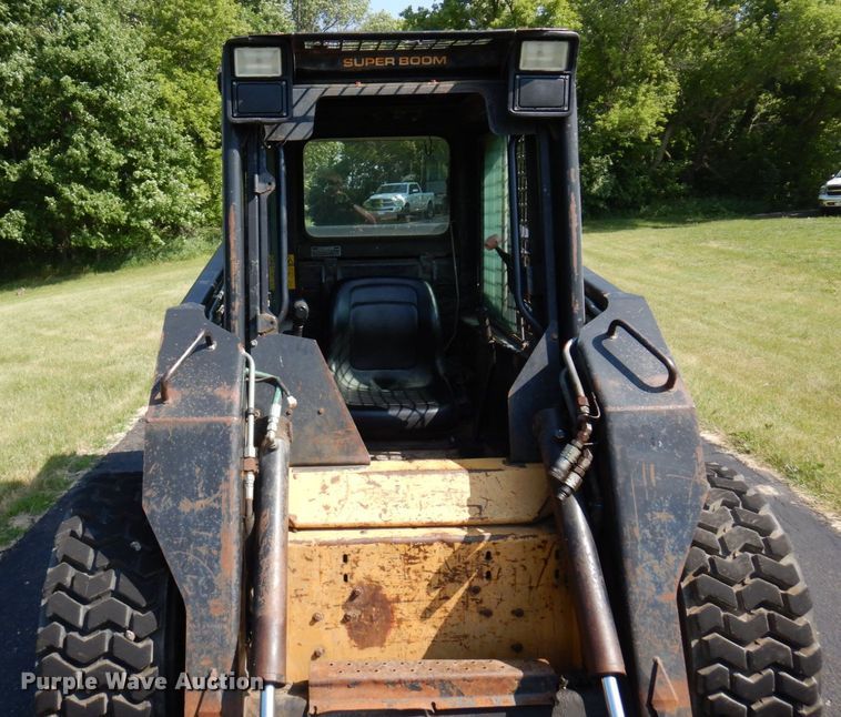 image for item DQ7331 1997 New Holland LX885 Turbo  skid steer loader