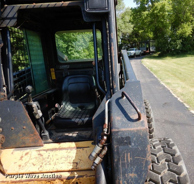 image for item DQ7331 1997 New Holland LX885 Turbo  skid steer loader