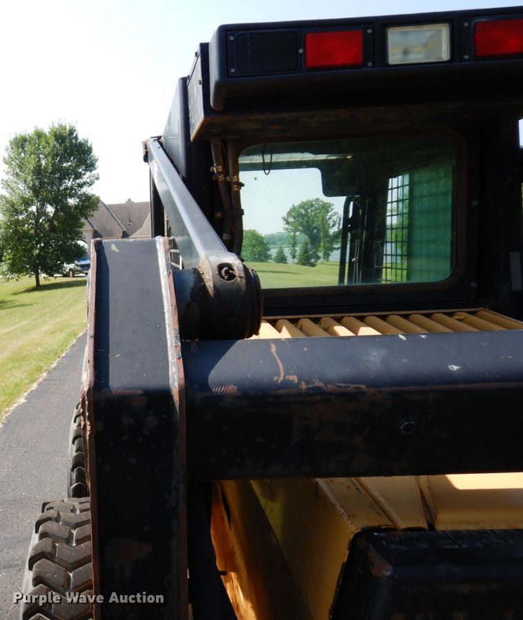 image for item DQ7331 1997 New Holland LX885 Turbo  skid steer loader