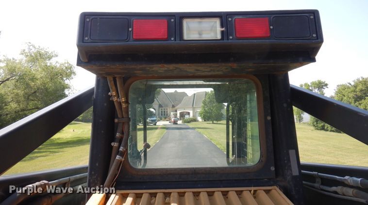 image for item DQ7331 1997 New Holland LX885 Turbo  skid steer loader