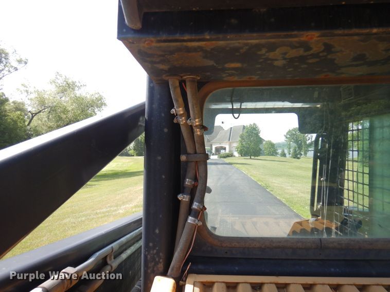 image for item DQ7331 1997 New Holland LX885 Turbo  skid steer loader