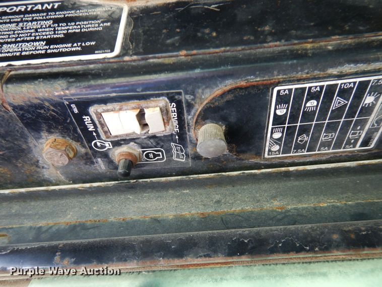 image for item DQ7331 1997 New Holland LX885 Turbo  skid steer loader