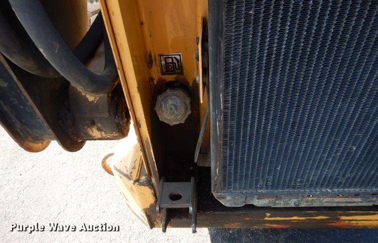 image for item DQ7331 1997 New Holland LX885 Turbo  skid steer loader