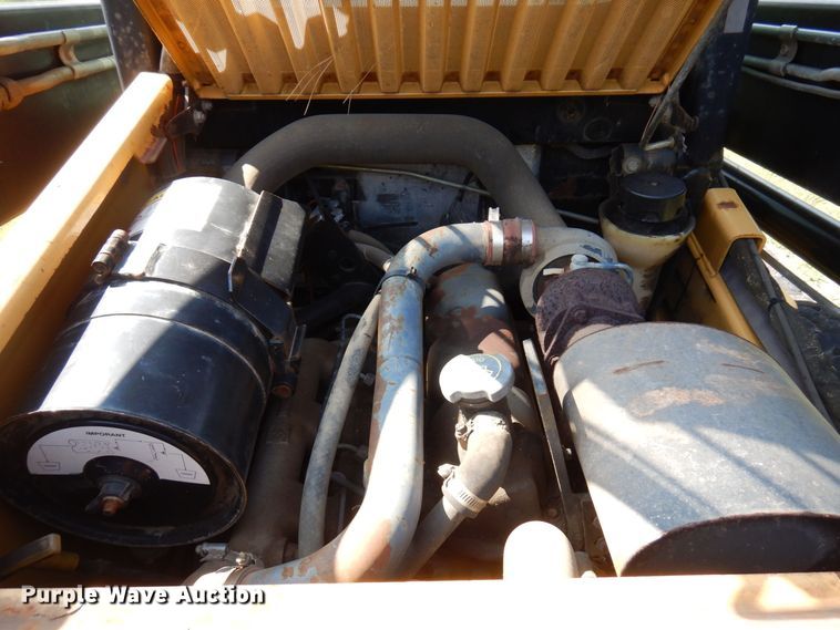 image for item DQ7331 1997 New Holland LX885 Turbo  skid steer loader