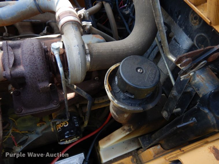 image for item DQ7331 1997 New Holland LX885 Turbo  skid steer loader