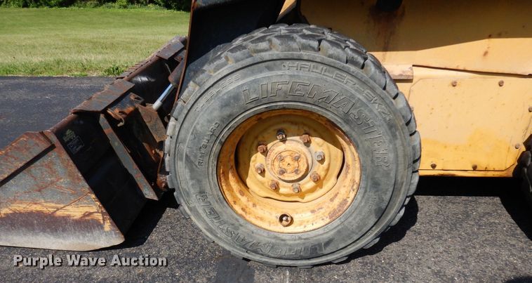 image for item DQ7331 1997 New Holland LX885 Turbo  skid steer loader