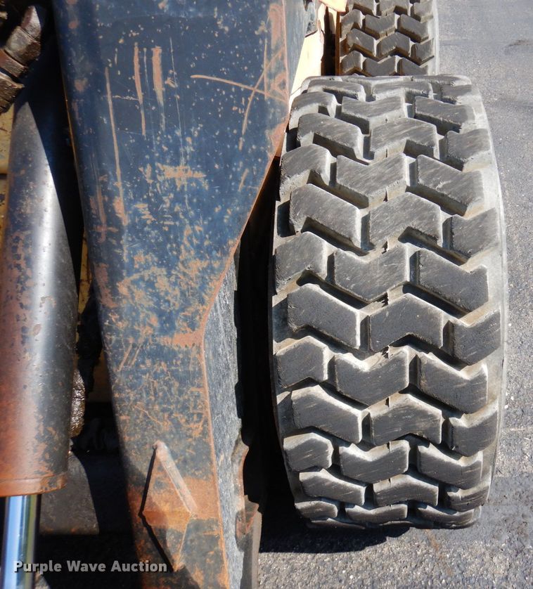 image for item DQ7331 1997 New Holland LX885 Turbo  skid steer loader