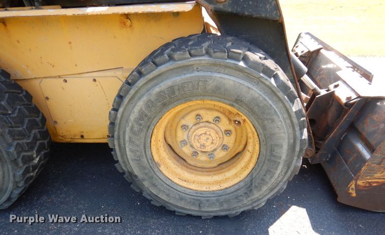 image for item DQ7331 1997 New Holland LX885 Turbo  skid steer loader