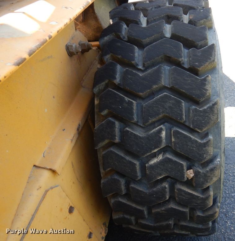 image for item DQ7331 1997 New Holland LX885 Turbo  skid steer loader