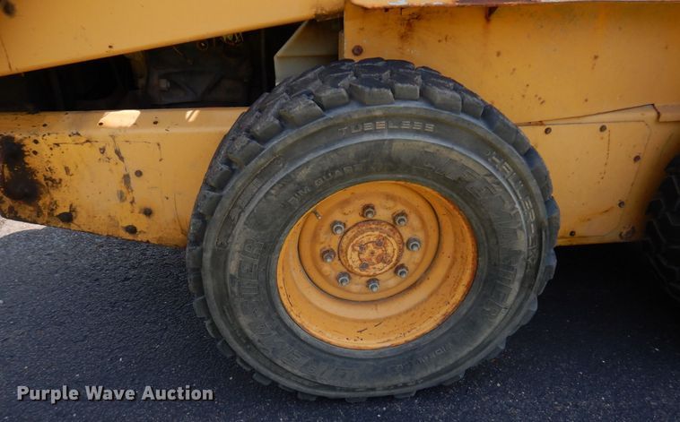 image for item DQ7331 1997 New Holland LX885 Turbo  skid steer loader