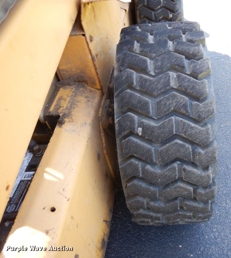 image for item DQ7331 1997 New Holland LX885 Turbo  skid steer loader