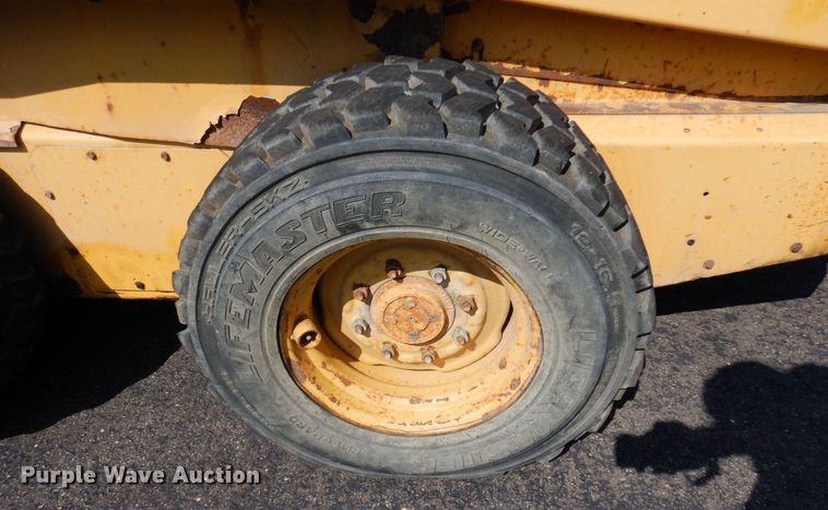 image for item DQ7331 1997 New Holland LX885 Turbo  skid steer loader