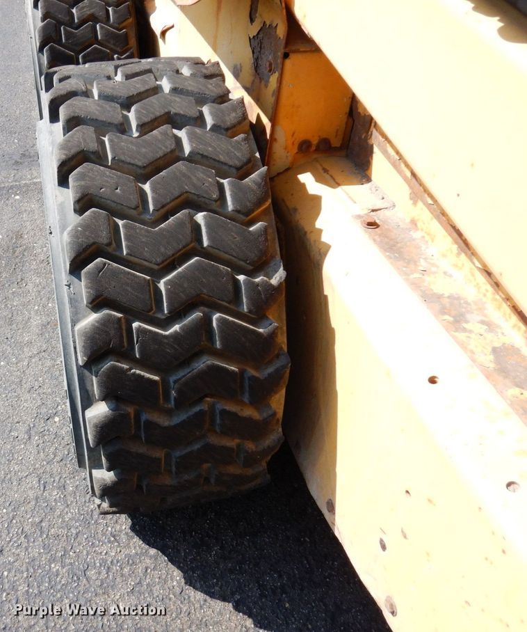 image for item DQ7331 1997 New Holland LX885 Turbo  skid steer loader