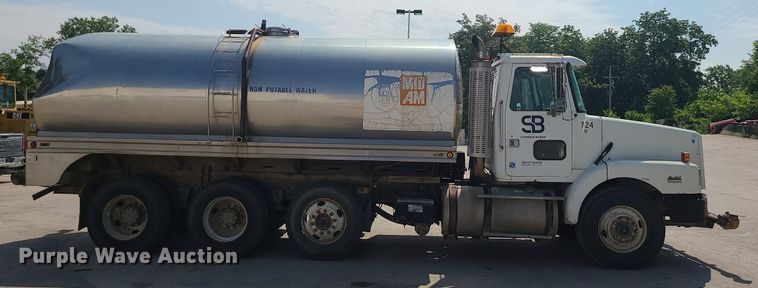 image for item LE9147 1998 Volvo WG  water truck