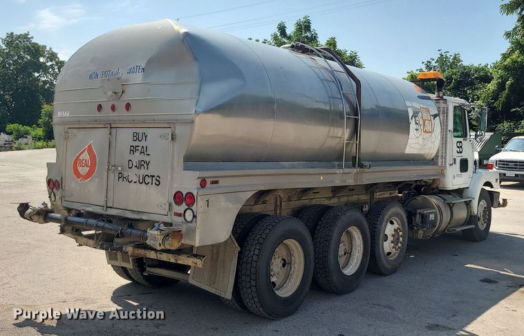 image for item LE9147 1998 Volvo WG  water truck