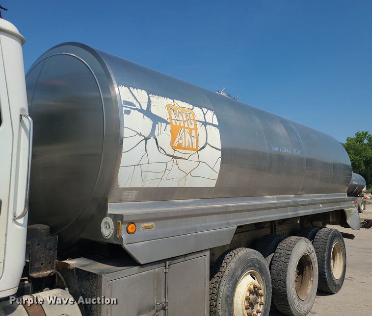 image for item LE9147 1998 Volvo WG  water truck