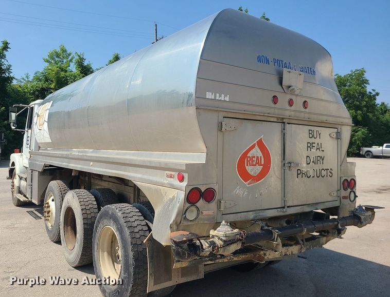 image for item LE9147 1998 Volvo WG  water truck