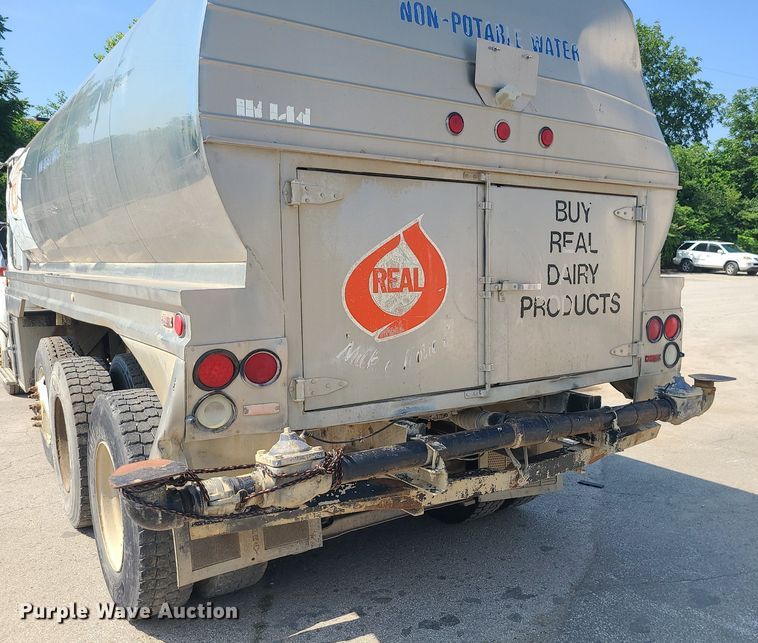 image for item LE9147 1998 Volvo WG  water truck