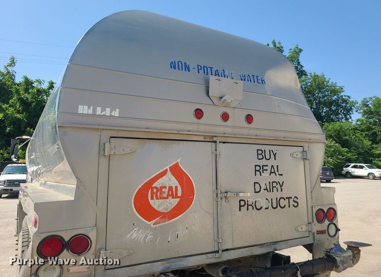 image for item LE9147 1998 Volvo WG  water truck