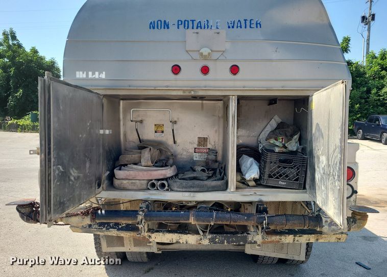 image for item LE9147 1998 Volvo WG  water truck