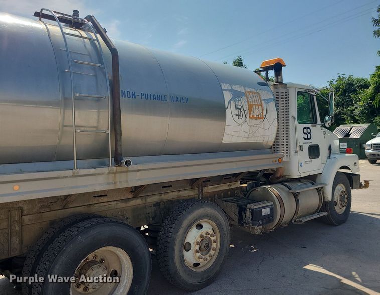 image for item LE9147 1998 Volvo WG  water truck