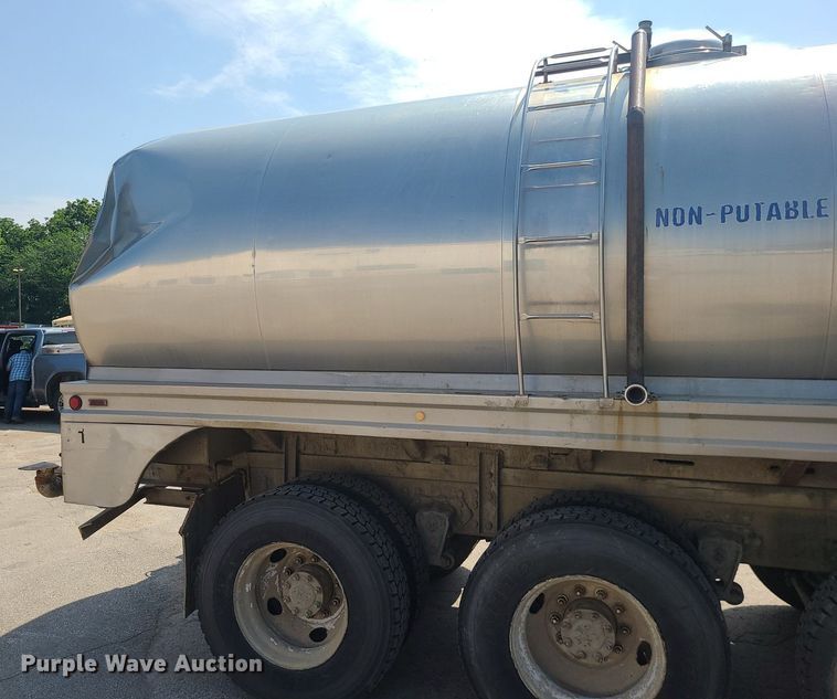 image for item LE9147 1998 Volvo WG  water truck