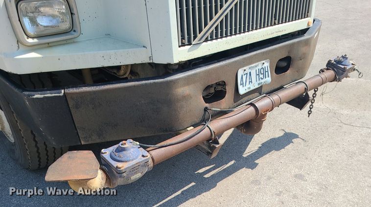 image for item LE9147 1998 Volvo WG  water truck