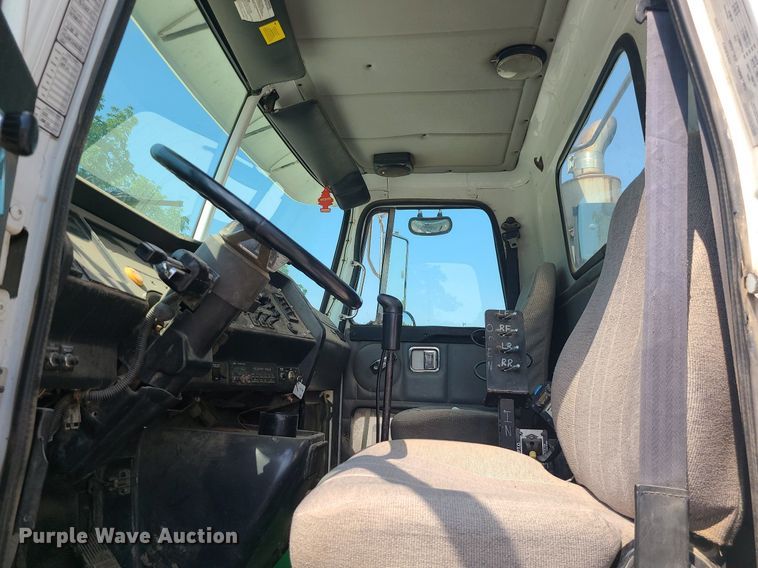 image for item LE9147 1998 Volvo WG  water truck