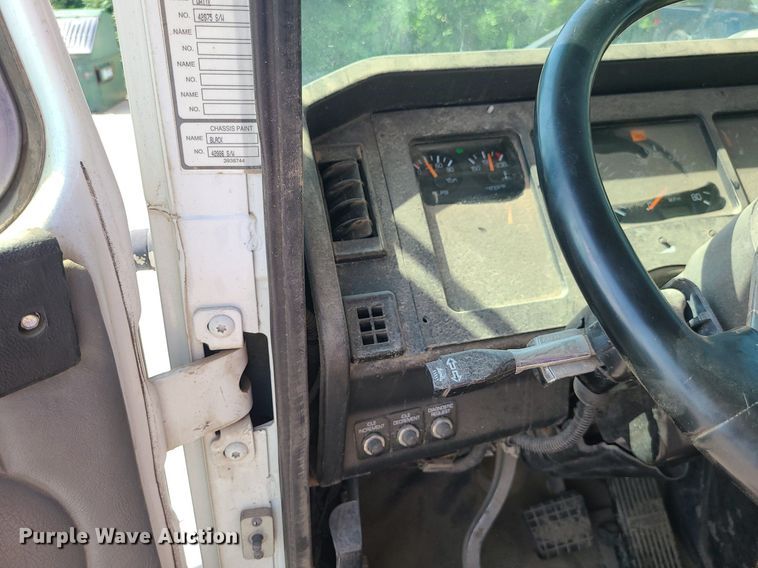 image for item LE9147 1998 Volvo WG  water truck