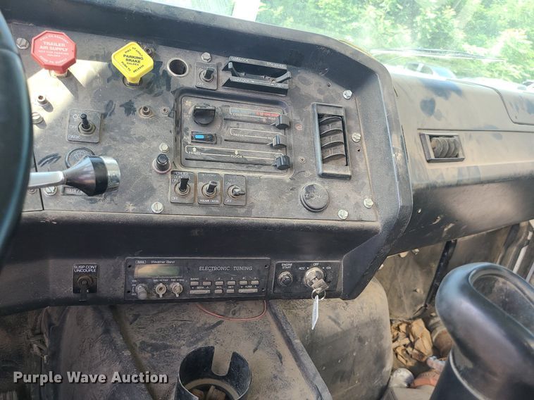 image for item LE9147 1998 Volvo WG  water truck